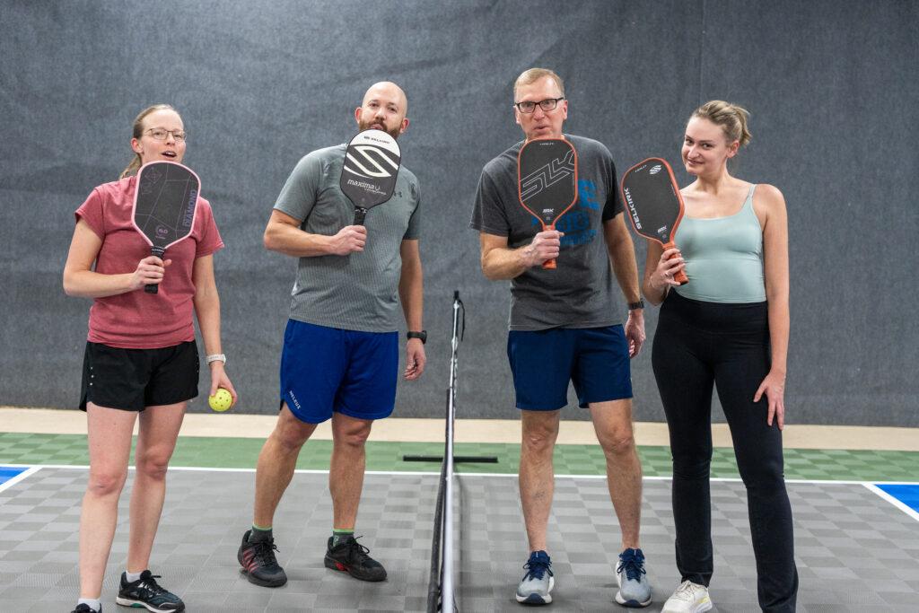 Friends with their Pickleball paddles